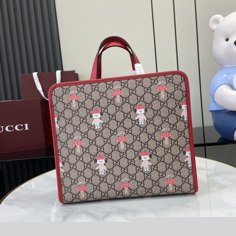 G*u*i shopping bags